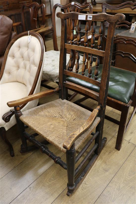A spindleback rocking chair